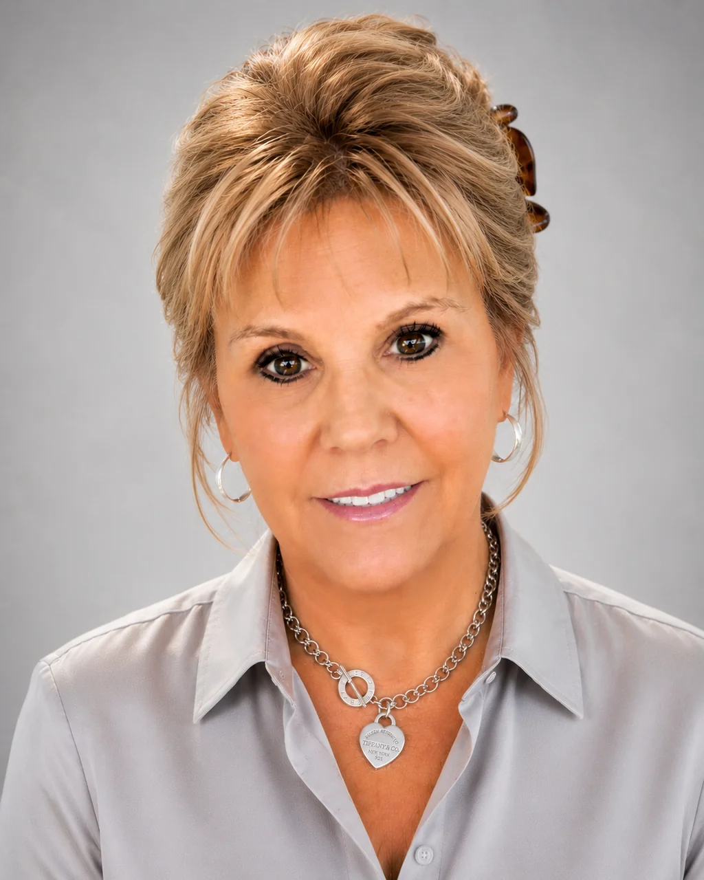 Portrait of Lisa Holliday, founder of Noble Mind Learning & Enrichment, smiling warmly.